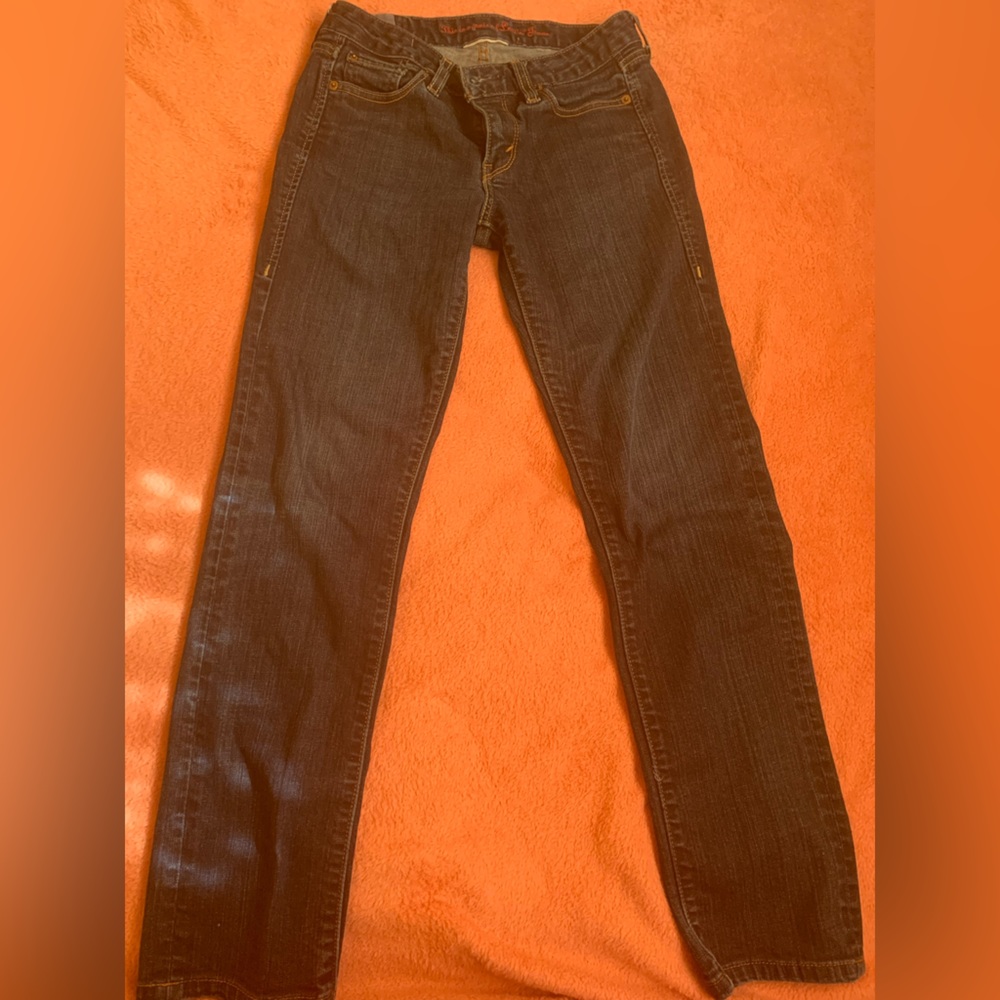 Dark wash size 4 Levi jeans.
